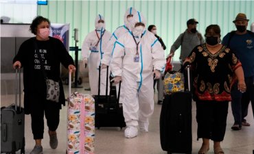 В США массово подтверждают случаи инфицирования “Омикроном”: что происходит с пациентами